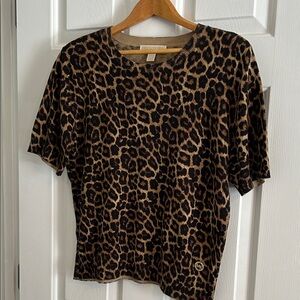 Women’s Michael Kors short sleeve sweater 
XL good condition leopard print
